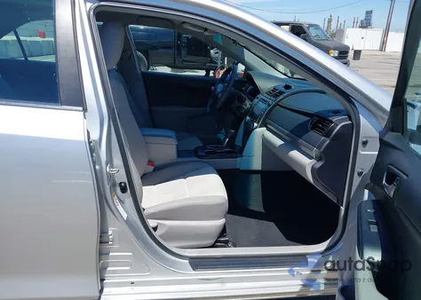 2014 Toyota Camry Le z USA, uszkodzony, nr VIN 4T4BF1FK3ER433285